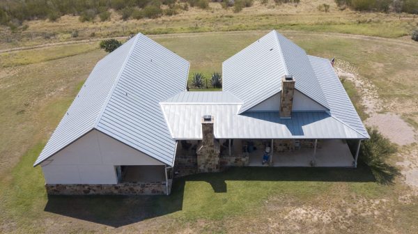 How to Clean a Metal Roof From the Ground