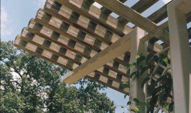 How to Attach a Pergola to a House with Gutters